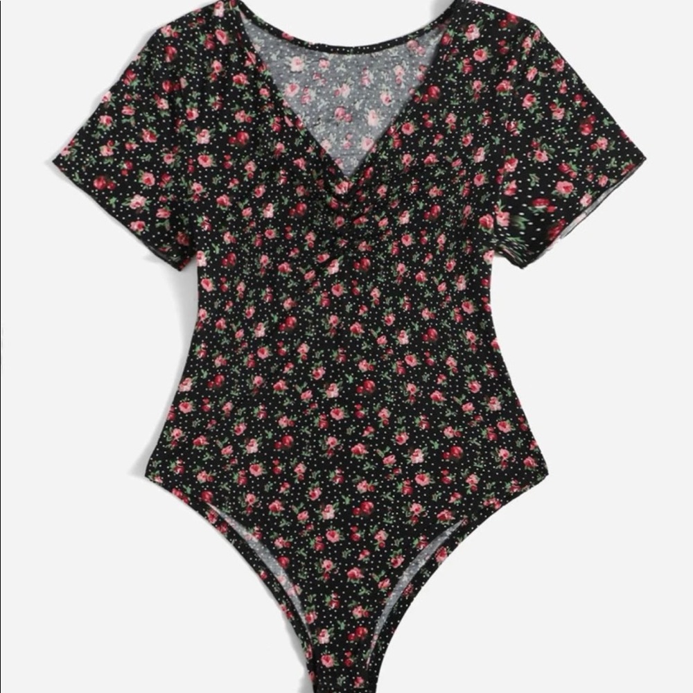 Plus size floral ruched front bodysuit.
